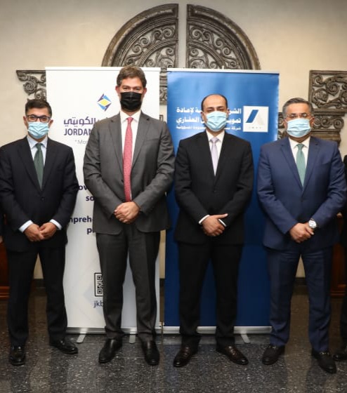 البنك الأردني الكويتي والشركة الأردنية لإعادة تمويل الرهن العقاري يوقعان اتفاقية تفاهم مشترك