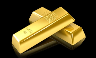 الذهب يرتفع إلى 1073 دولاراً للأونصة مع تراجع الدولار
